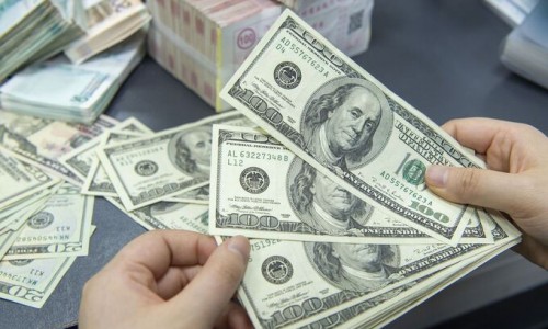 Đà tăng của USD có thể làm giảm tốc kinh tế thế giới
