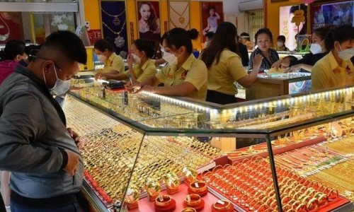 Vàng hạ nhiệt, USD bất ngờ tăng giá