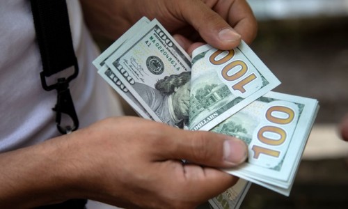 Đà tăng của USD dừng sau quyết định lãi suất của Fed
