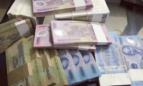 Xử nghiêm vi phạm trong mua bán ngoại tệ, đổi tiền dịp Tết